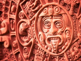 Mexican face carving in a wall